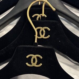 CHANEL Black Hangers with Gold Accents
